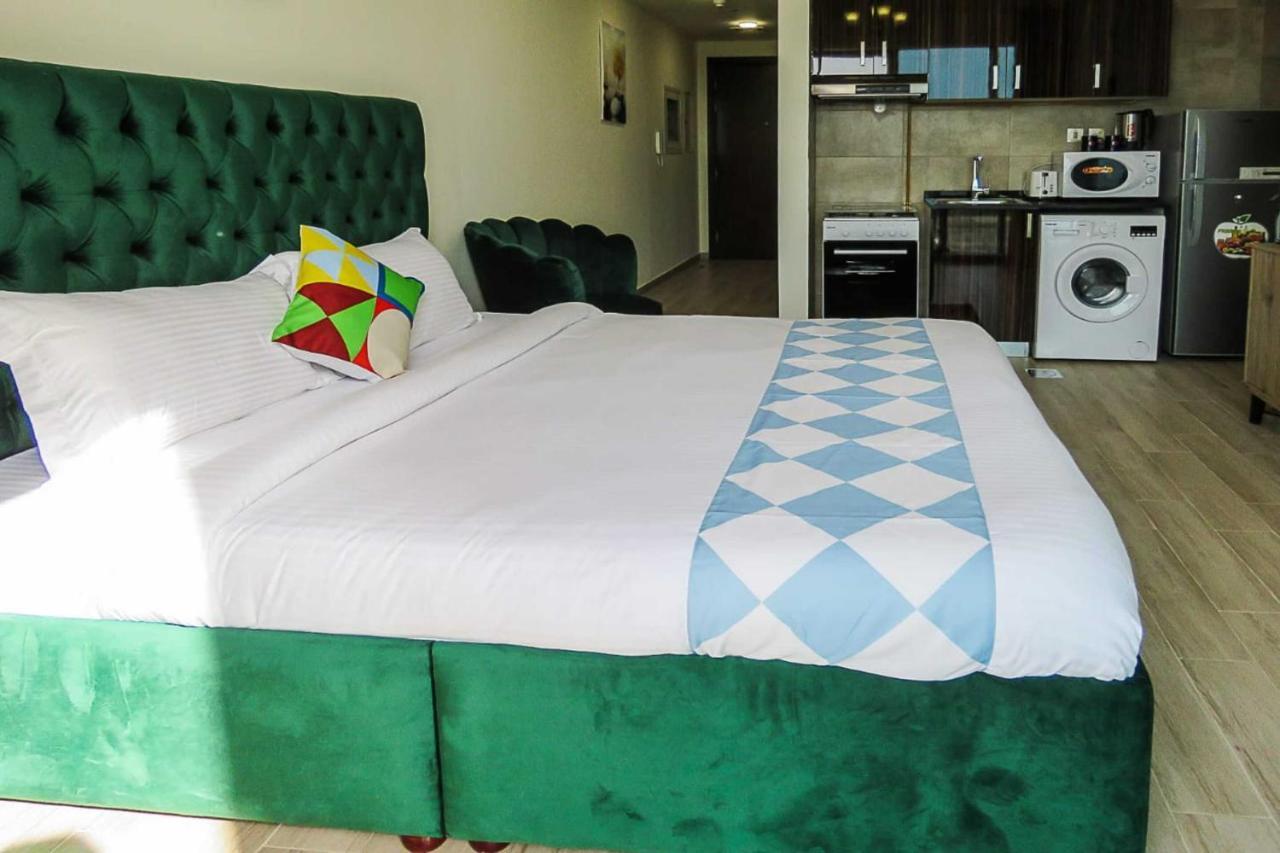 Oyo 860 Studio Apartment, Maya Tower 4, Jumeirah Village Triangle Dubai Exterior photo