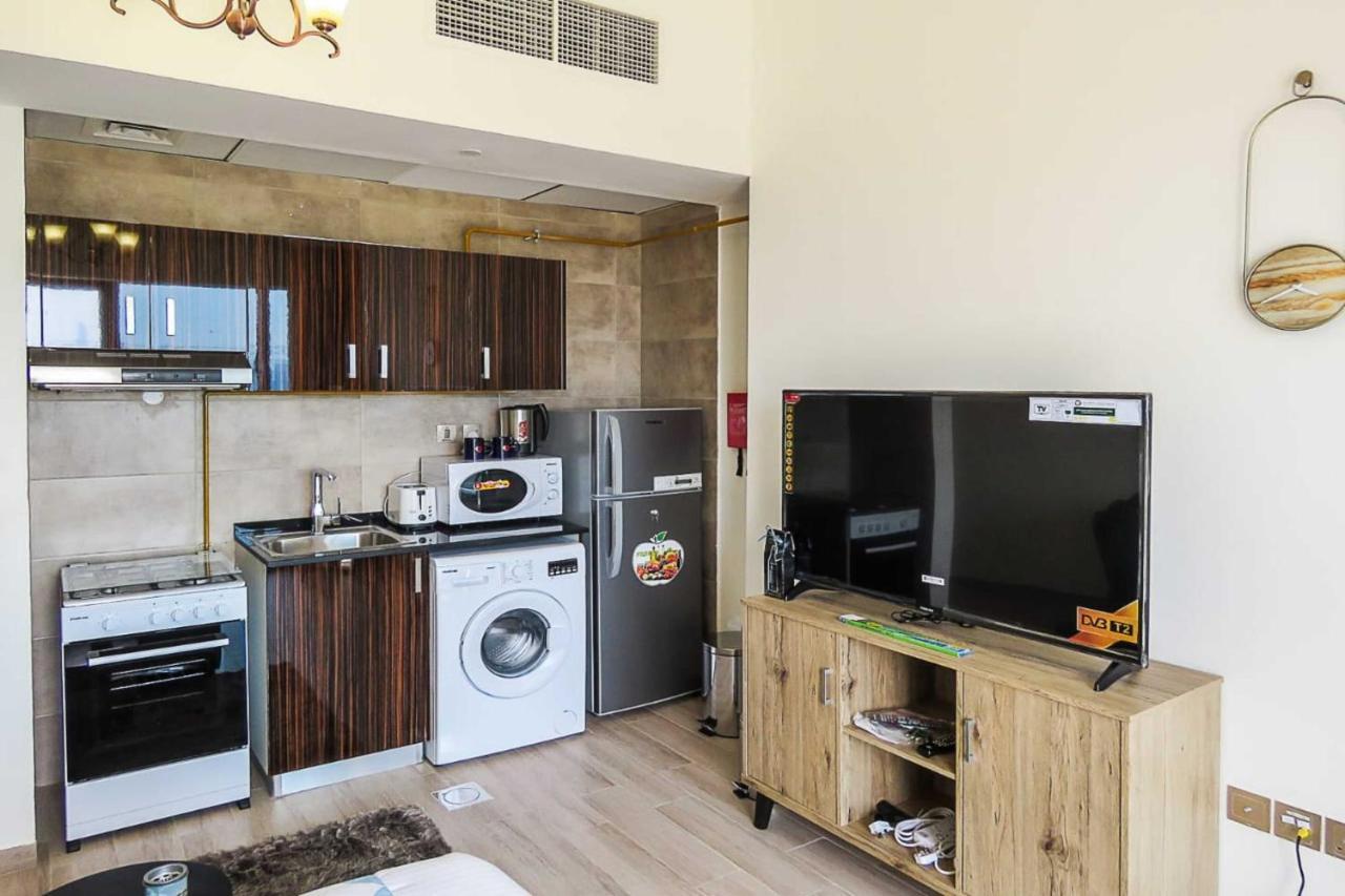 Oyo 860 Studio Apartment, Maya Tower 4, Jumeirah Village Triangle Dubai Exterior photo