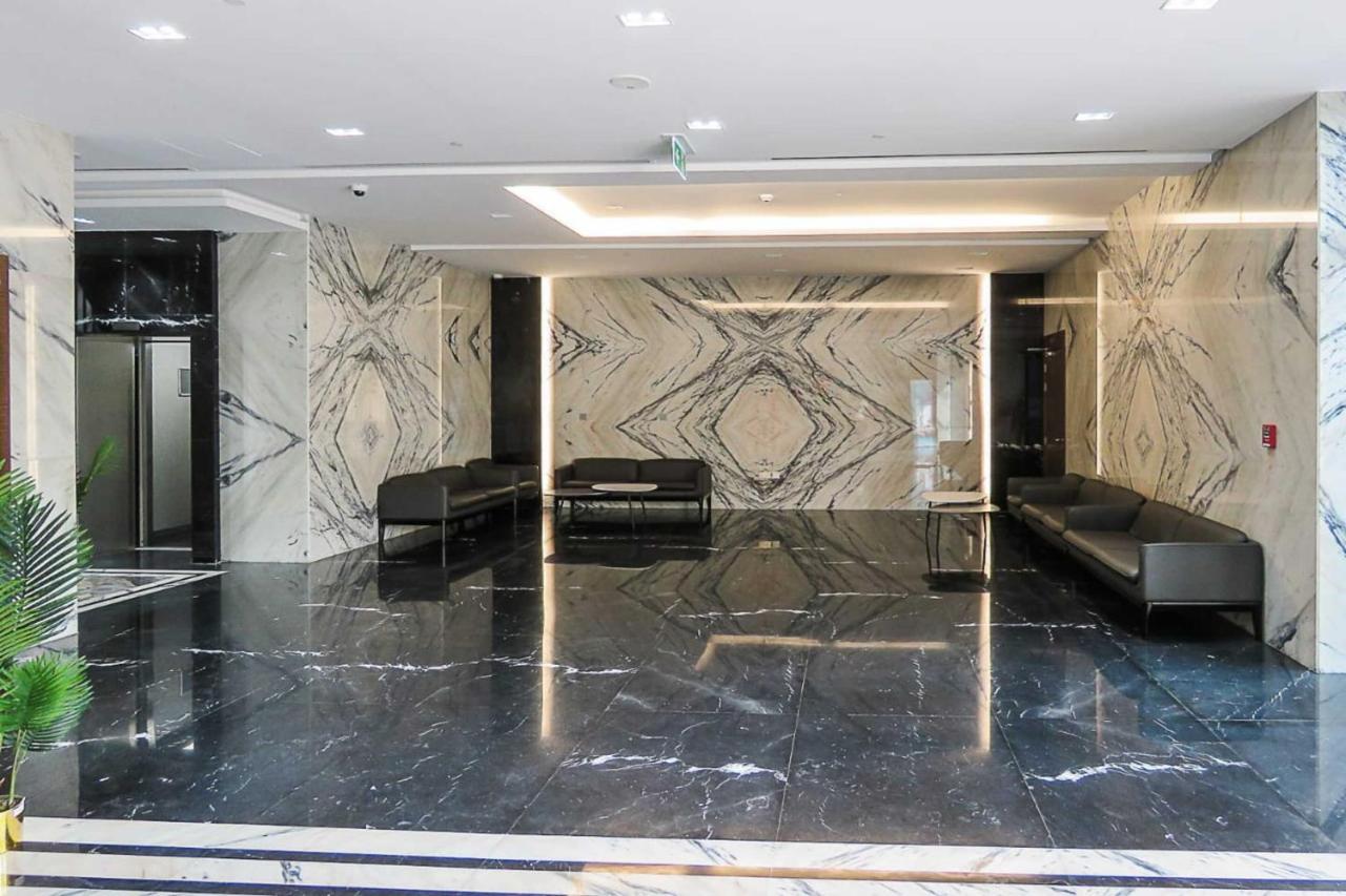 Oyo 860 Studio Apartment, Maya Tower 4, Jumeirah Village Triangle Dubai Exterior photo